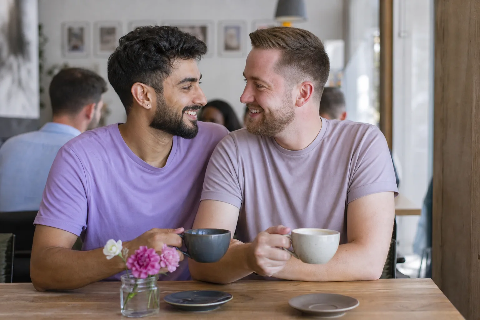 Two men talking over coffee in Aylesbury town centre